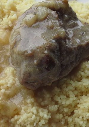 Foto principal de Carrilleras de cerdo en salsa de cebolla y vino blanco