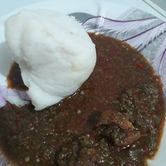 A picture of Tuwon shinkafa and okro soup.