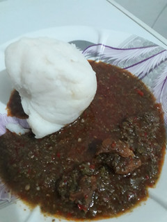 A picture of Tuwon shinkafa and okro soup.