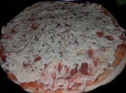 Una foto de salsa de tomate para pizza