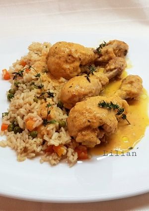A picture of Lemon Chicken Drumsticks with Brown Rice & Vegetables.