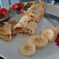 A picture of My Banana Cinnamon Pancake Wrap for Breakfast. 💗.