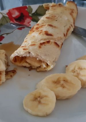 A picture of My Banana Cinnamon Pancake Wrap for Breakfast. 💗.