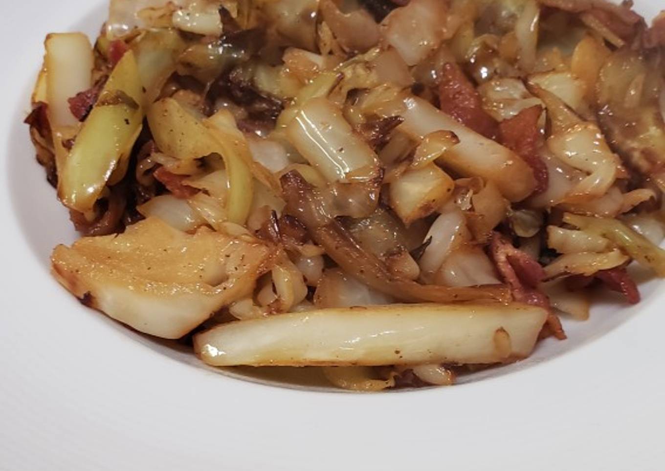 A simple cabbage, onion, garlic and bacon salad