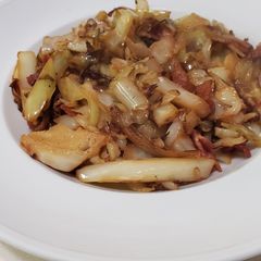 A picture of Simple cabbage, onion, garlic and bacon salad.