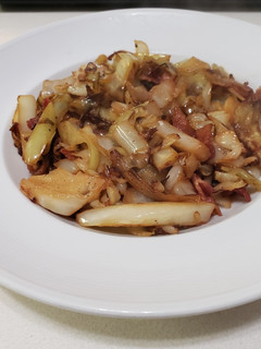 A picture of Simple cabbage, onion, garlic and bacon salad.
