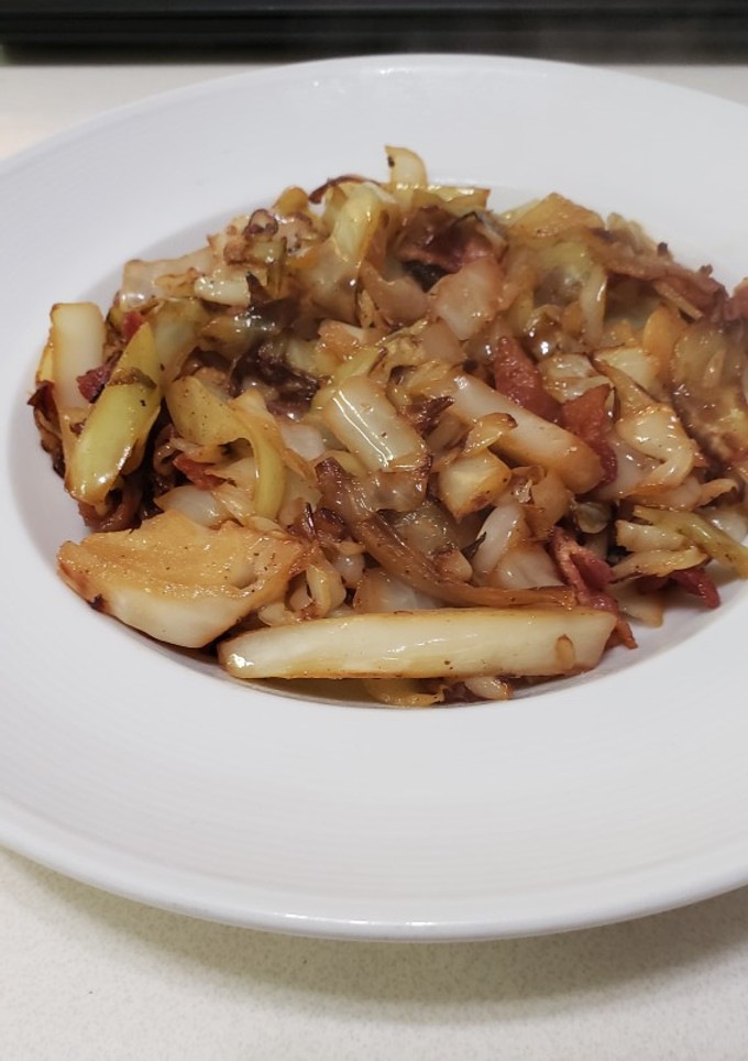 A picture of Simple cabbage, onion, garlic and bacon salad.