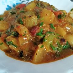 A picture of Radish potato brinjal curry in mustard paste.