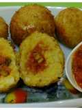 Fried Sambhar Rice Balls with stuffed Concasse Sauce