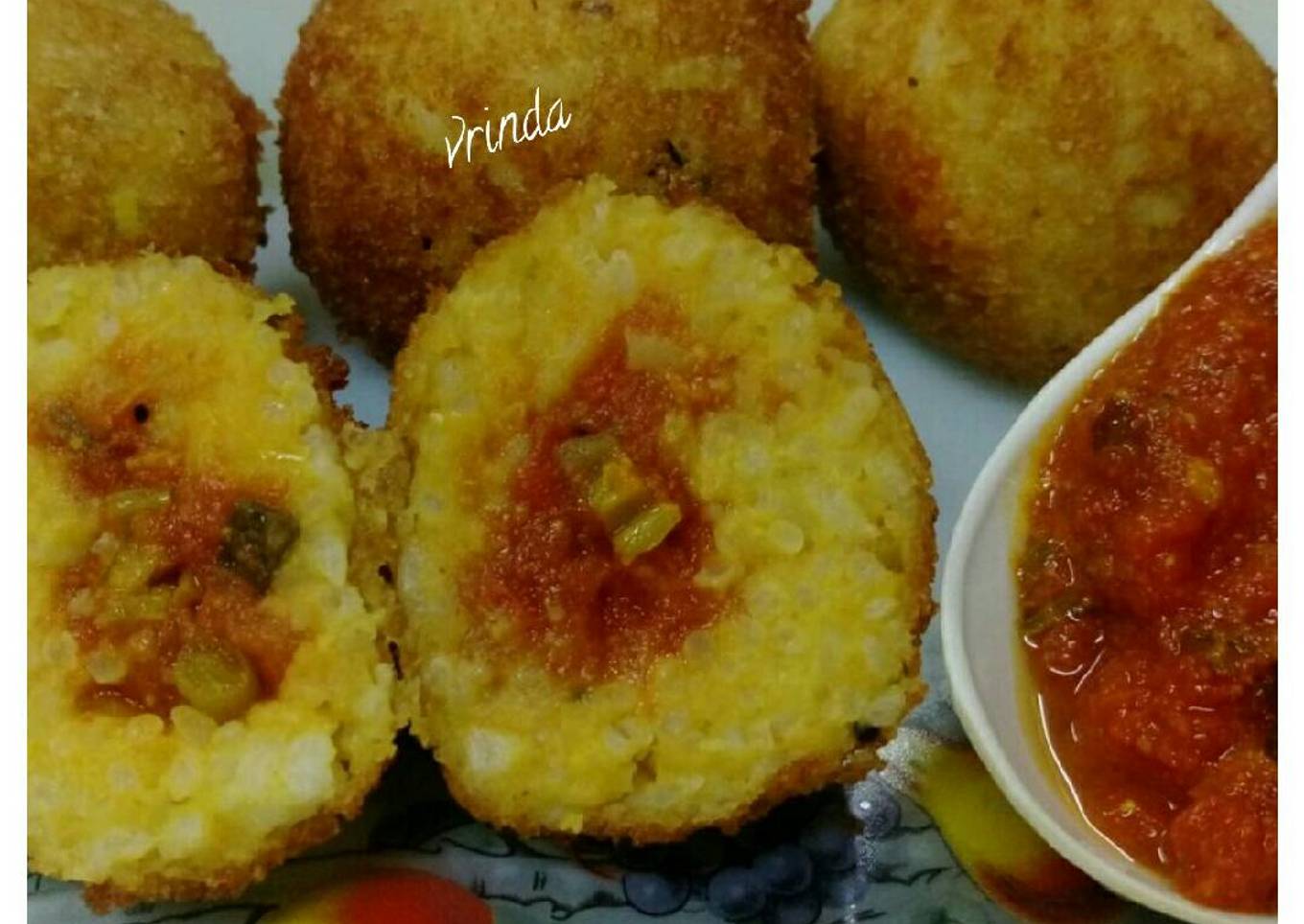 Fried Sambhar Rice Balls with stuffed Concasse Sauce