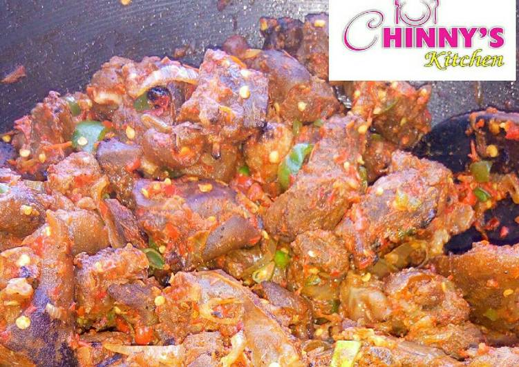 Asun {spicy goat meat)