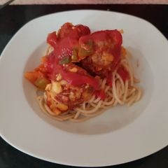 A picture of My chilli +Garlic Meatballs on top of spaghetti.