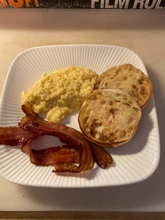 A picture of Creamy eggs with bacon.
