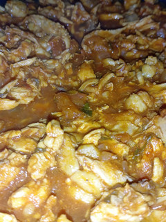 Una foto de Pollito desmechado en salsa de tomate