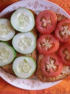 A picture of Cucumber, Tomato sandwich.