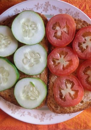 A picture of Cucumber, Tomato sandwich.