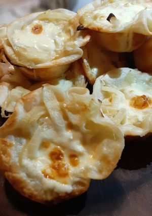 Una foto de Canastitas de cebolla y 3 quesos