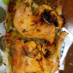 A picture of Roast chicken with Lemon and Rosemary.