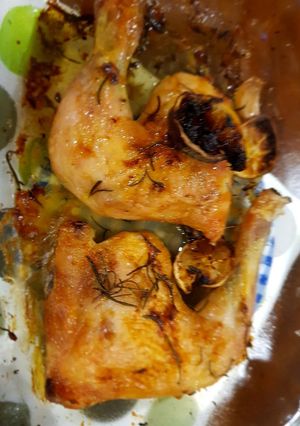 A picture of Roast chicken with Lemon and Rosemary.