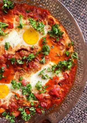 A picture of Shakshouka (Eggs in Spicy Tomato Sauce).