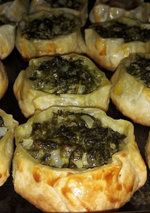 Una foto de Canastitas de espinaca y queso