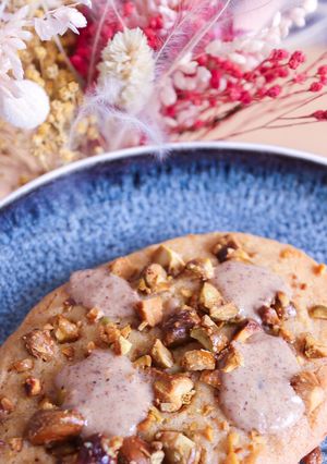 Une photo de Cookie pistache praliné chocolat blanc