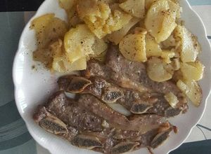 Foto principal de Churrasco al horno con patatas a las hierbas provenzales
