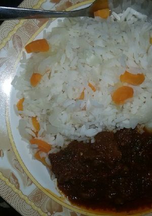 A picture of White rice with cabbage,carrot &stew.