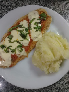 Una foto de Milanesa de pescadilla a la napolitana
