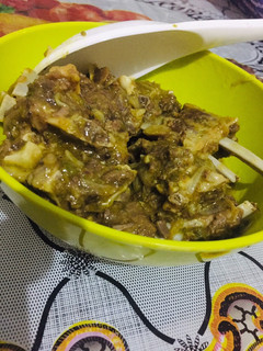 A picture of Mutton in green sauce.