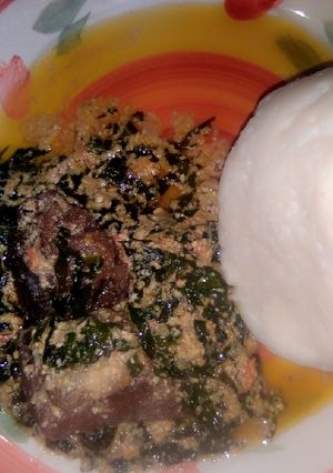 A picture of Tuwo Rice, ugu and egusi soup.