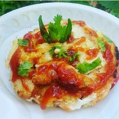 A picture of Chilli cheese  tikki  bread burger.