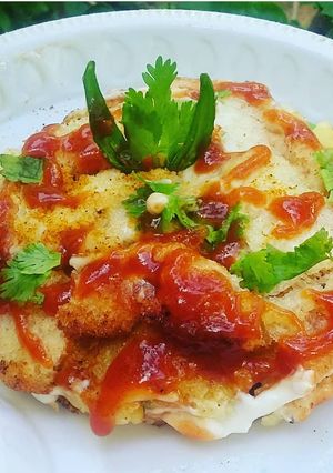 A picture of Chilli cheese tikki bread burger.