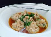 Una foto de dumplings al vapor
