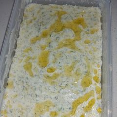 A picture of Tzaziki - yogurt cucumber cream.