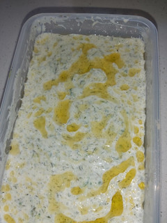 A picture of Tzaziki - yogurt cucumber cream.
