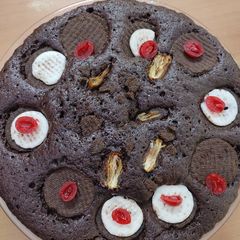 A picture of Chocolate coffee dry fruits Cinnamon cake.