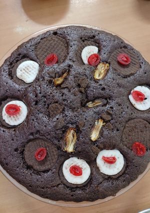 A picture of Chocolate coffee dry fruits Cinnamon cake.
