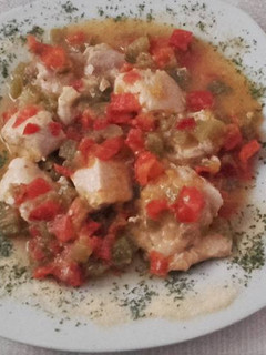 Una foto de Pollo con pimiento rojo y verde