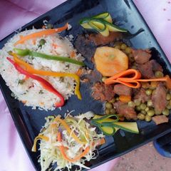 A picture of Irish Stew,vegetable rice and steamed cabbage.