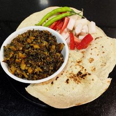 A picture of Mooli ke Patton Ki Sabzi - (Radish Greens Stir Fry).