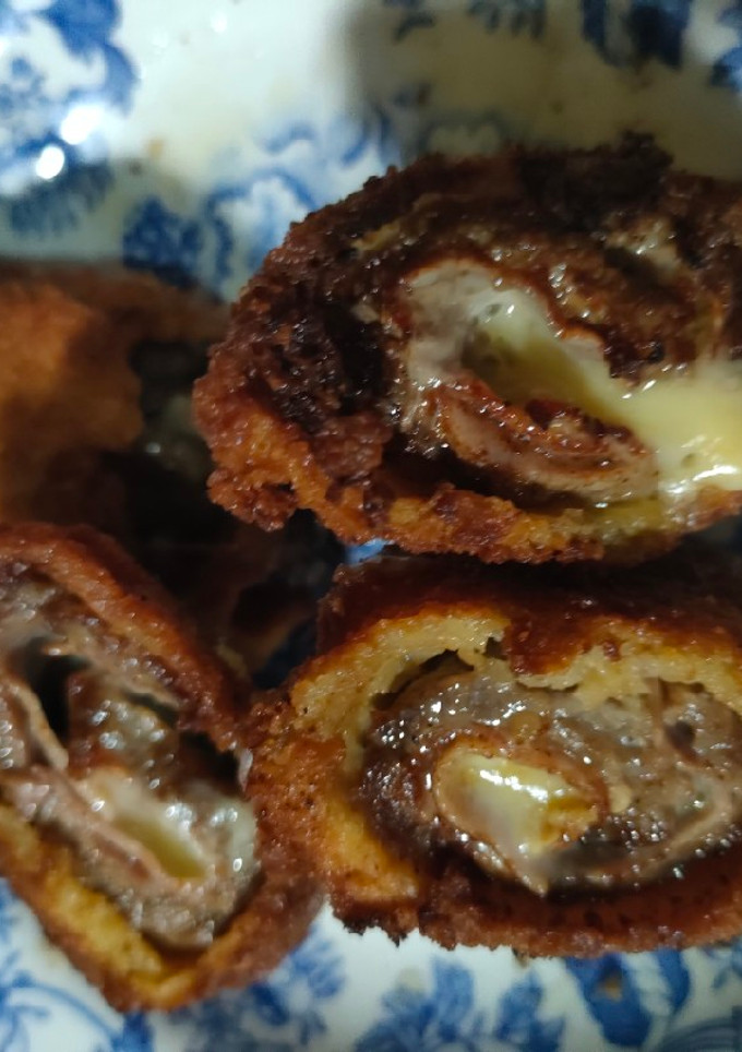 Una foto de Flamenquín de bistec con jamón dulce y queso semicurado