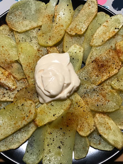 Una foto de Patatas bravas 🥔 Cal Marcjenni