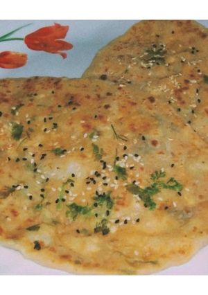 A picture of Aloo Paneer Stuffed Kulcha.