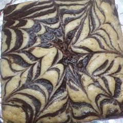 Marbal cake👩🍳👩🍳😋😋 A picture of Marbal cake👩🍳👩🍳😋😋.