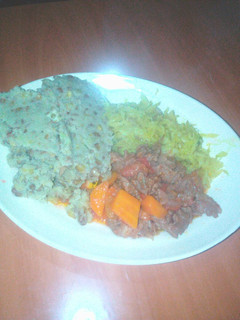 A picture of Mukimo served with beef and veges.