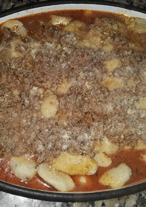 Una foto de Ñoquis de queso y orégano