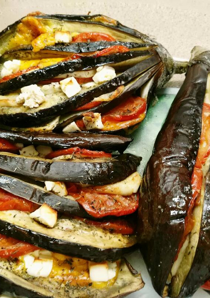 Una foto de Berenjenas tres quesos al horno