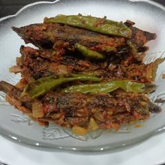A picture of Bitter Gourd with Tomato.