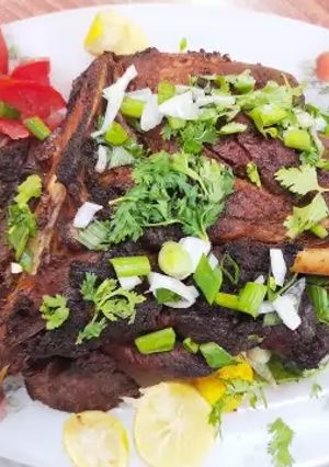 A picture of Mutton baked raan.